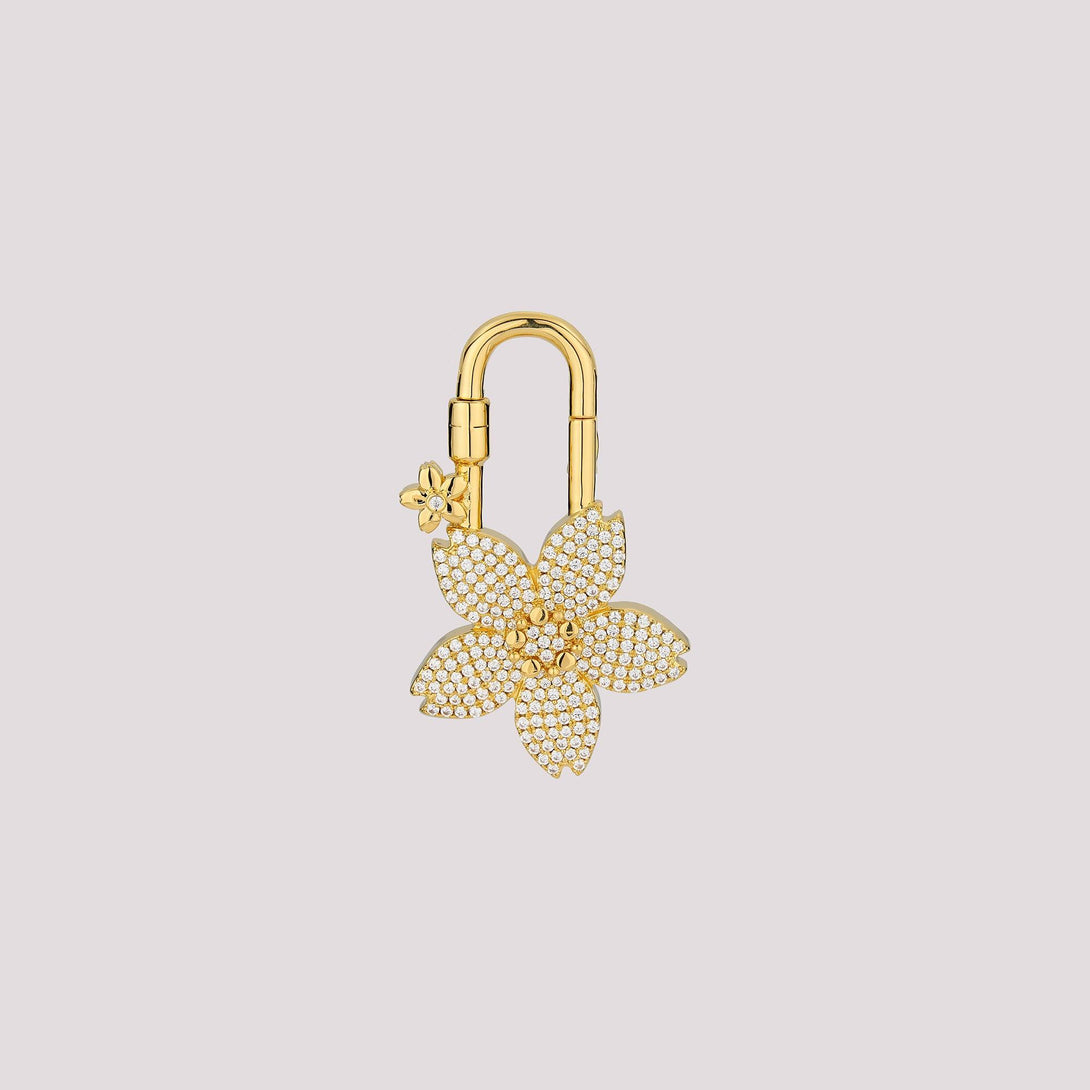 The pavé sakura design features two colors in one charm—white crystals on the front and pink crystals on the back. It’s perfect for those who love options without the need to splurge on two! A stunning accessory designed to elevate your Hermès collection or any high-end handbag.