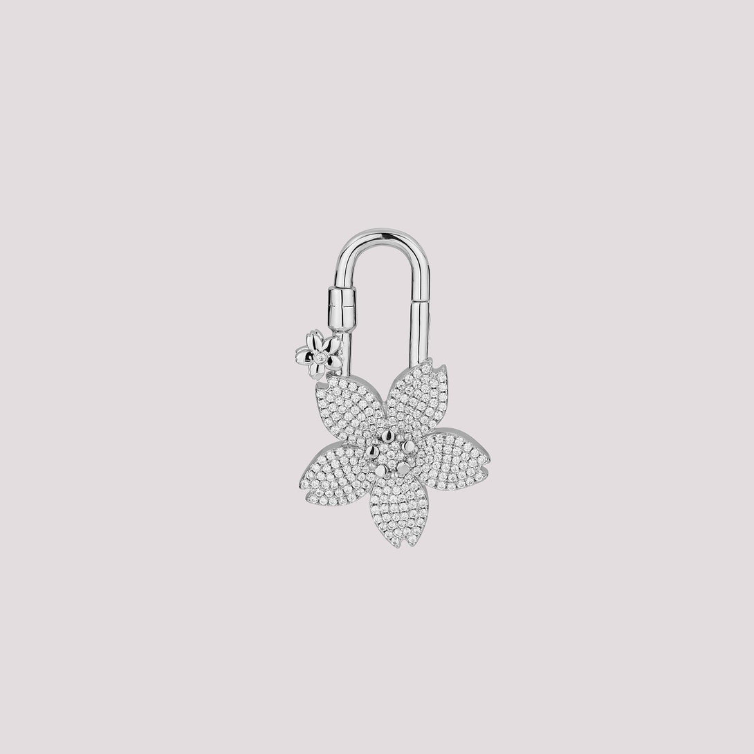 The pavé sakura design features two colors in one charm—white crystals on the front and pink crystals on the back. It’s perfect for those who love options without the need to splurge on two! A stunning accessory designed to elevate your Hermès collection or any high-end handbag.