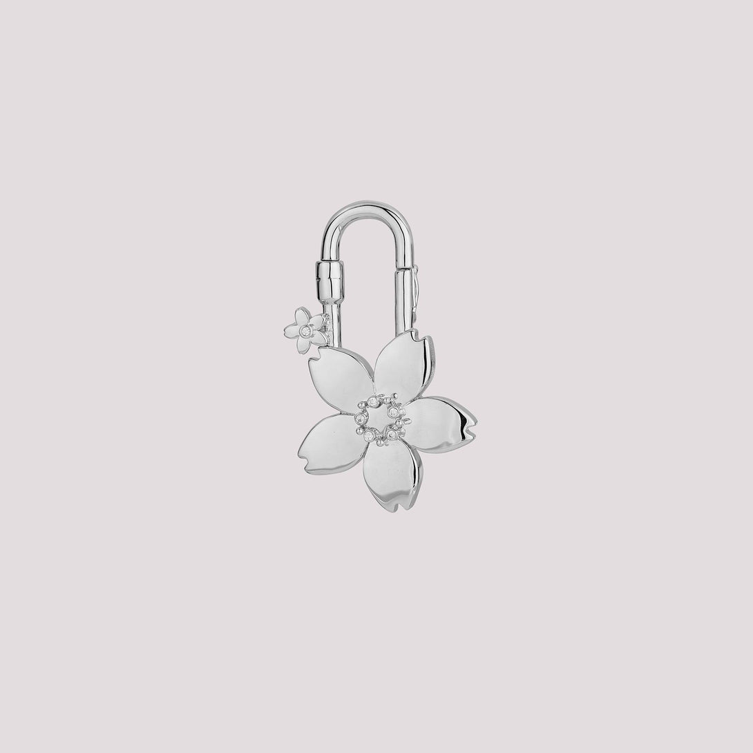 Sleek plain Cherry Blossom bag charm with a minimalist design and high-quality craftsmanship. A delicate and elegant accessory, perfect for enhancing Hermès and luxury handbags