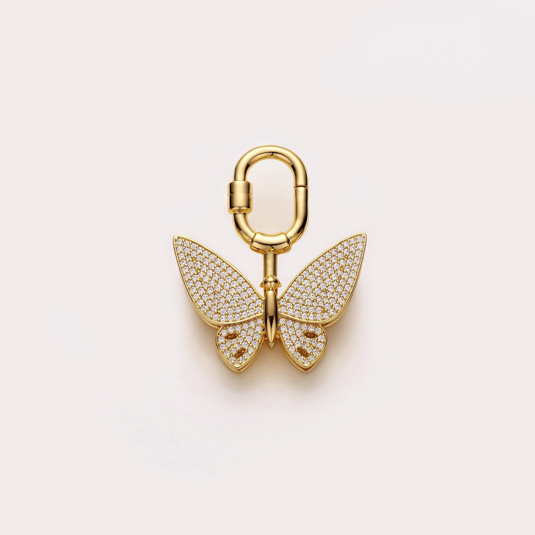 Handcrafted gold butterfly bag charm made with gold plated metal and zirconia stones, adding elegance to hermes handbags