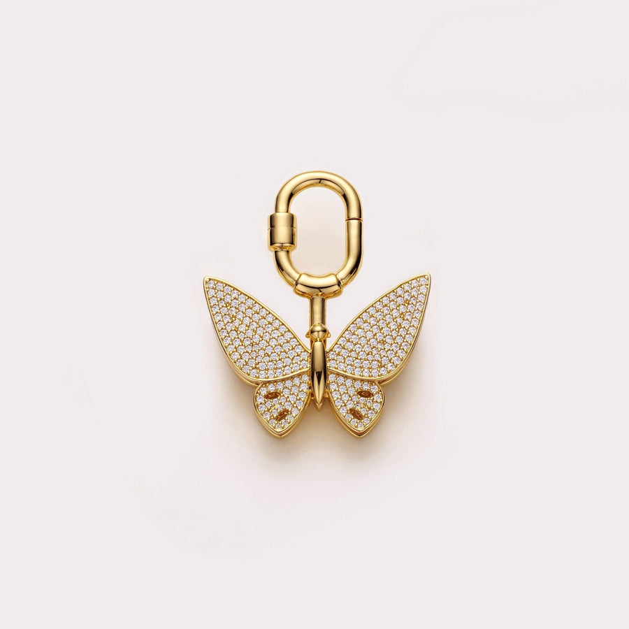 Handcrafted gold butterfly bag charm made with gold plated metal and zirconia stones, adding elegance to hermes handbags