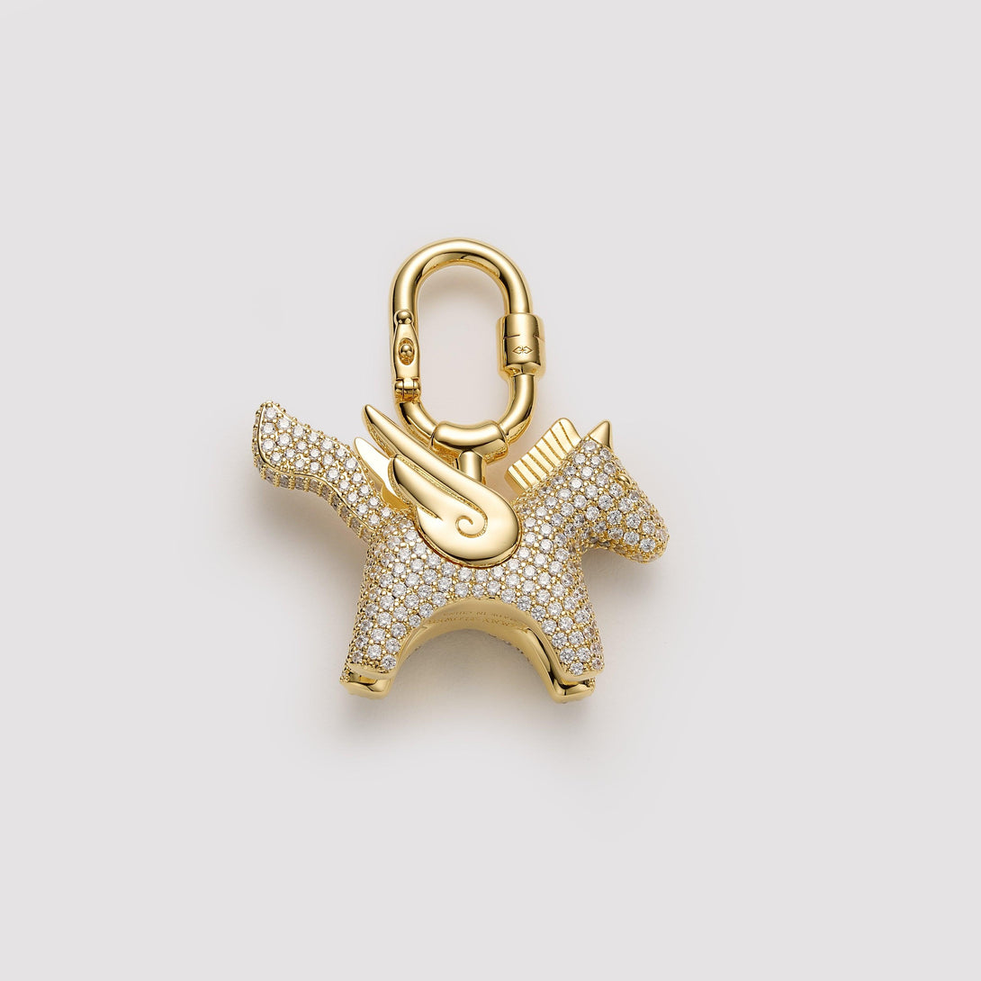 Gold pavé Pegasus bag charm, handcrafted with intricate detailing and designed for Hermès and luxury handbags. A premium accessory to elevate high-end bag collections.