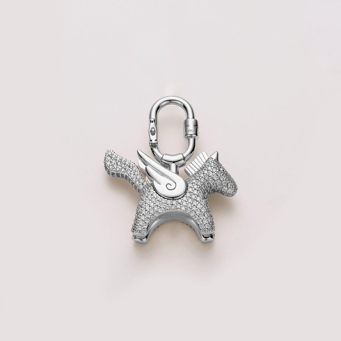 Charming Pegasus pony design bag charm with gold plating and sparkling pavé stones, Hermès-compatible and designed to elevate luxury handbags.